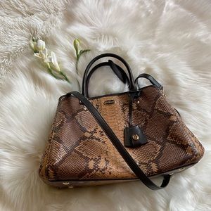 Coach Women’s Top Handle. Removable strap. Mildly used. Great condition.